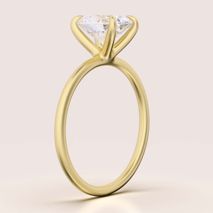 pierscionek-zareczynowy-solitaire-forever-moissanit-1_5ct-szlif-owalny-bok-zolte-zloto-hariets.jpg