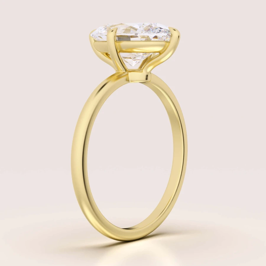 pierscionek-zareczynowy-royal-stones-stella-moissanit-3_5ct-szlif-owalny-bok-zolte-zloto-hariets.jpg
