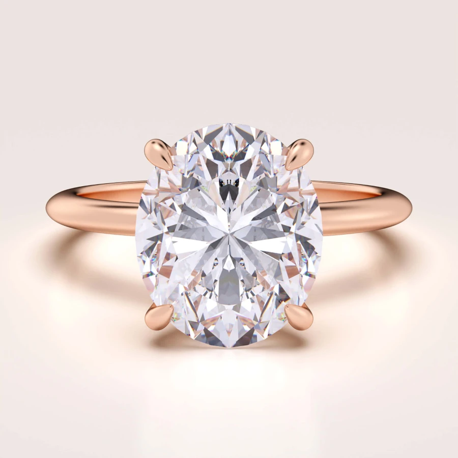 pierscionek-zareczynowy-royal-stones-moissanit-5ct-szlif-owalny-rozowe-zloto-paris-hariets.jpg
