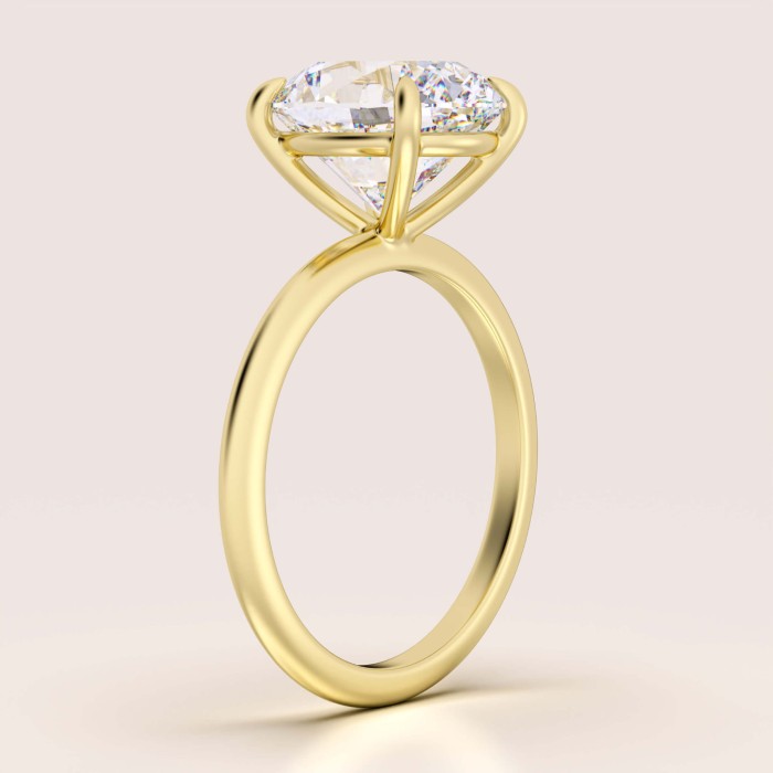 pierscionek-zareczynowy-royal-stones-moissanit-5ct-szlif-owalny-bok-zolte-zloto-paris-hariets.jpg