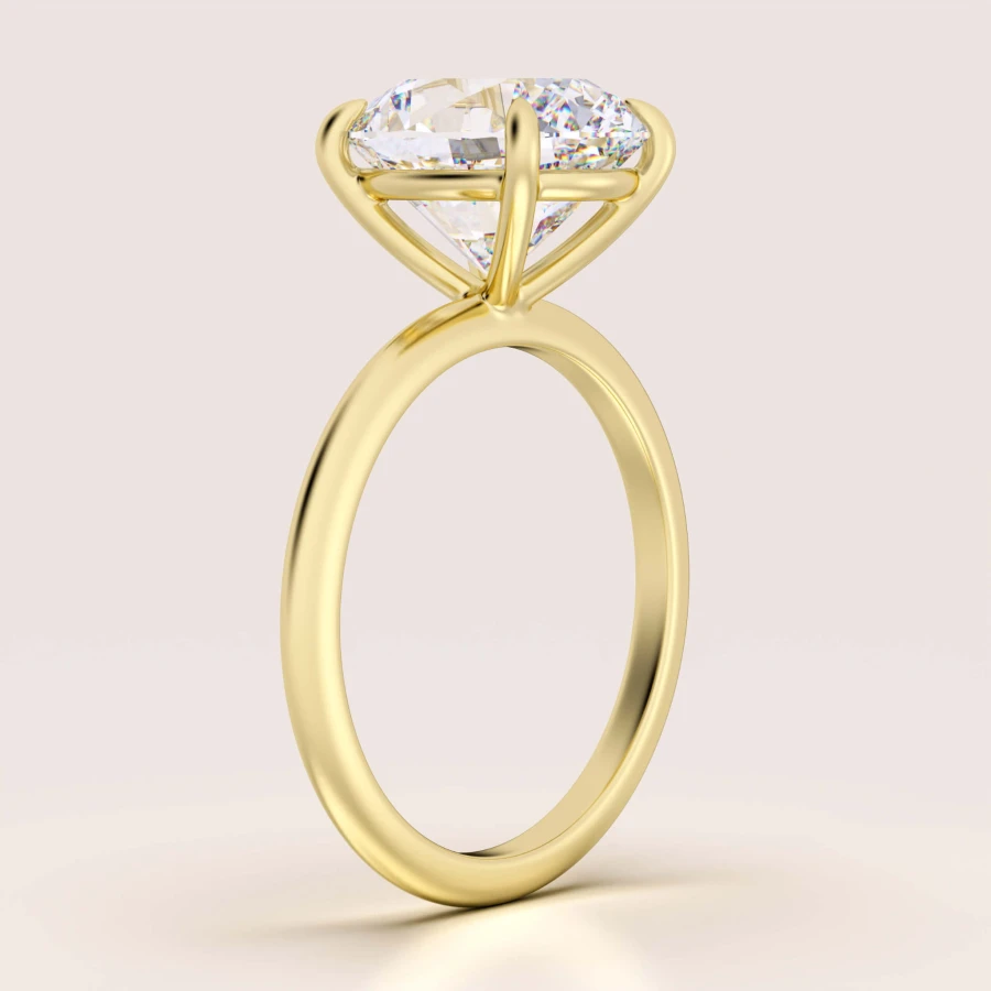 pierscionek-zareczynowy-royal-stones-moissanit-5ct-szlif-owalny-bok-zolte-zloto-paris-hariets.jpg