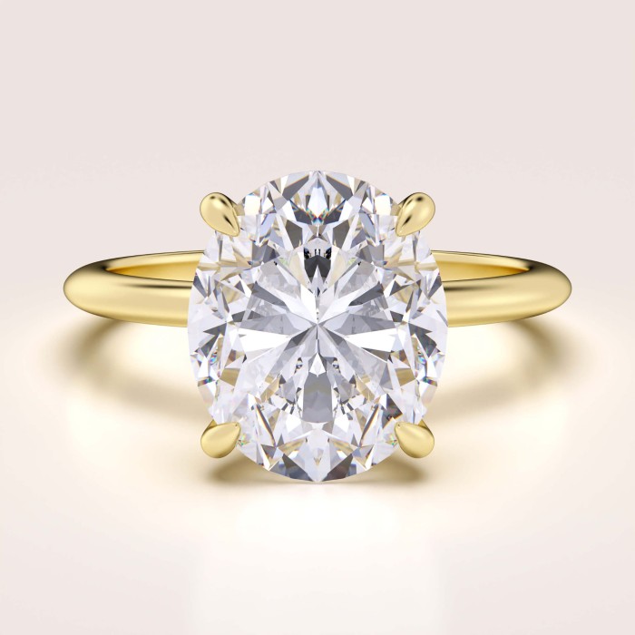 pierscionek-zareczynowy-royal-stones-moissanit-5ct-szlif-owalny-zolte-zloto-paris-hariets.jpg