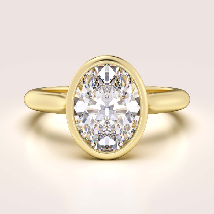 pierscionek-zareczynowy-bezel-moissanit-1-2ct-szlif-owalny-zolte-zloto-amora-hariets-2.jpg