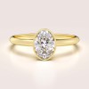 pierscionek-zareczynowy-bezel-moissanit-0-5ct-szlif-owalny-zolte-zloto-pure-hariets.jpg