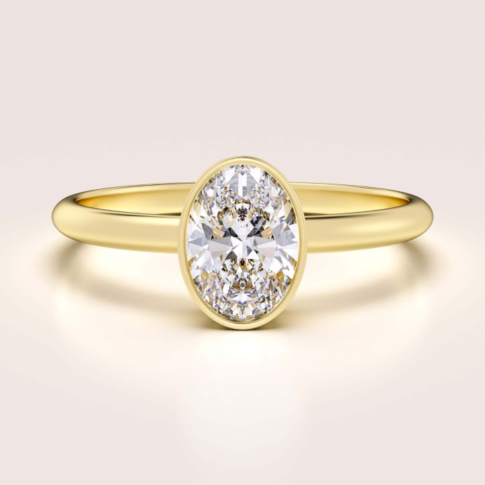 pierscionek-zareczynowy-bezel-moissanit-0-5ct-szlif-owalny-zolte-zloto-pure-hariets.jpg