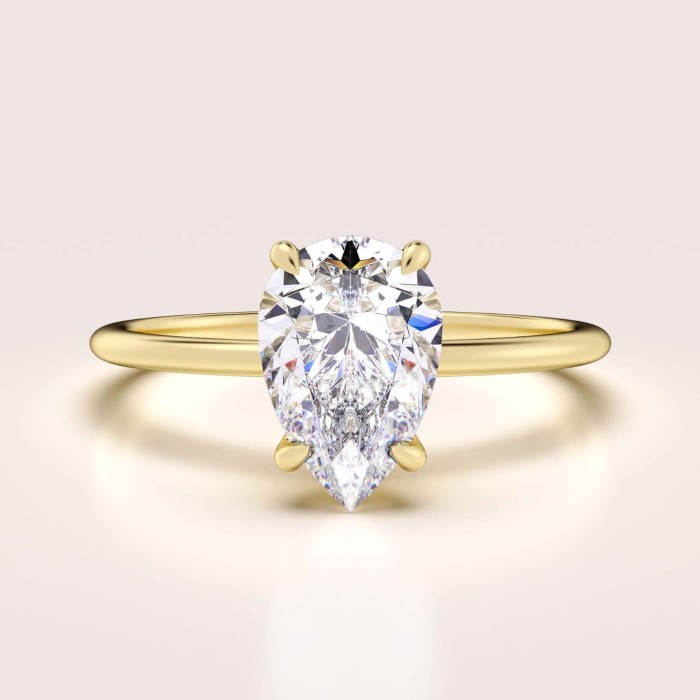 pierscionek-zareczynowy-solitaire-lumiere-moissanit-1-5ct-szlif-gruszka-zolte-zloto-hariets.jpg