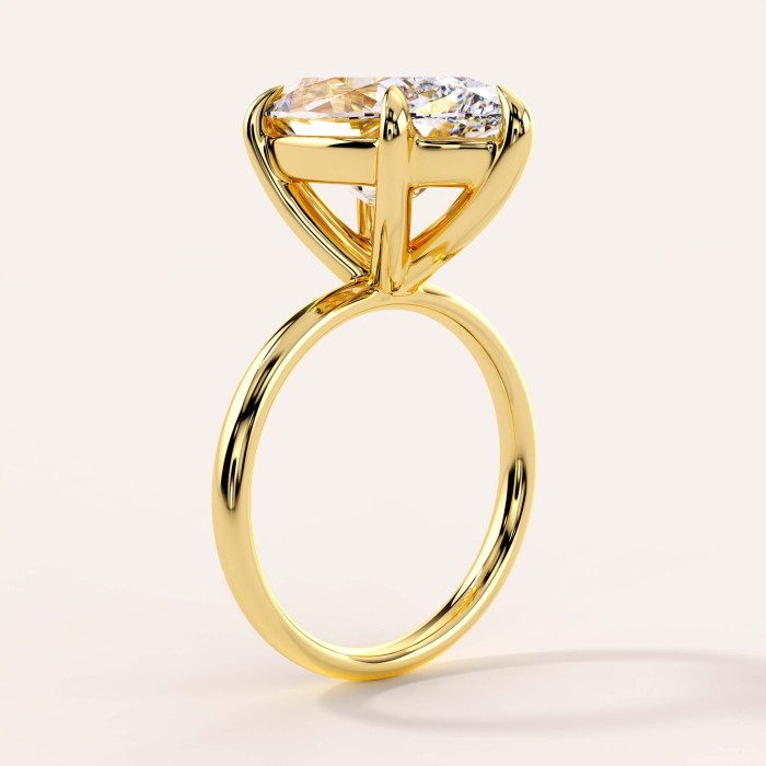 pierscionek-zareczynowy-moissanit-5ct-szlif-markiza-zolte-zloto-bok-royal-stones-imperia-hariets.jpg
