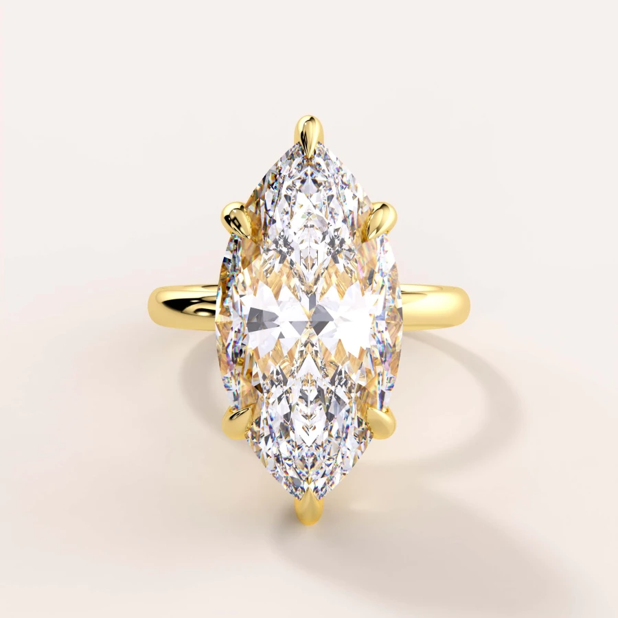 pierscionek-zareczynowy-moissanit-5ct-szlif-markiza-zolte-zloto-royal-stones-imperia-hariets.jpg
