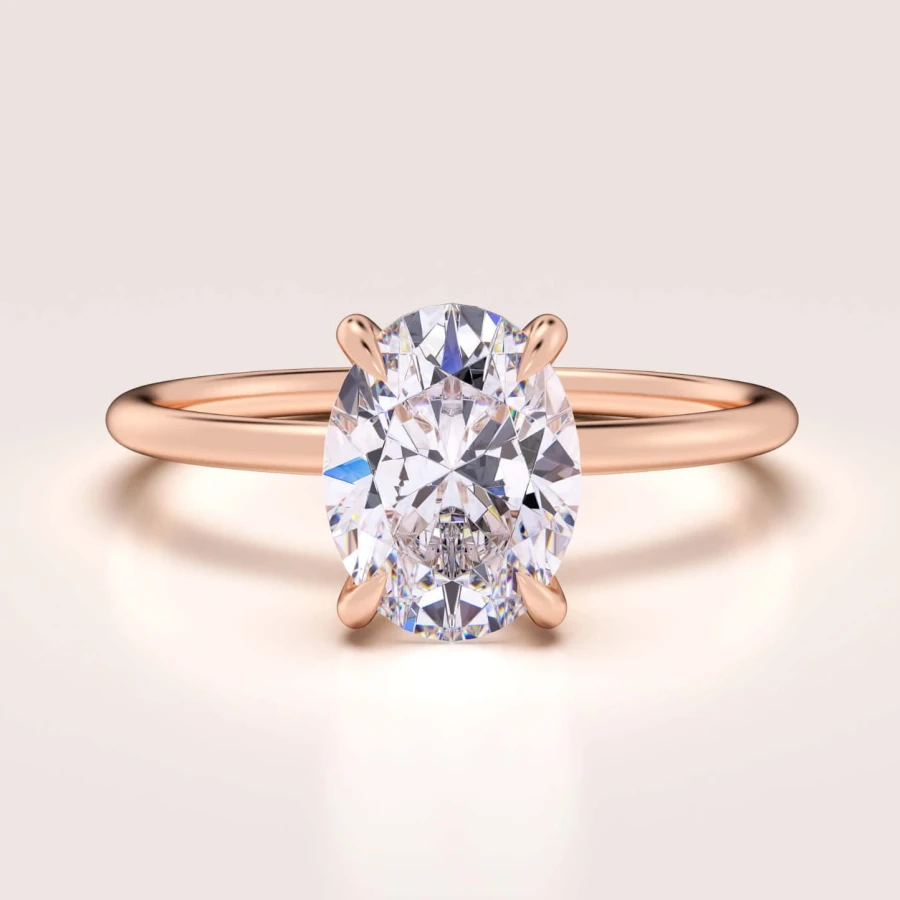 pierscionek-zareczynowy-solitaire-forever-moissanit-1_5ct-szlif-owalny-rozowe-zloto-hariets.jpg